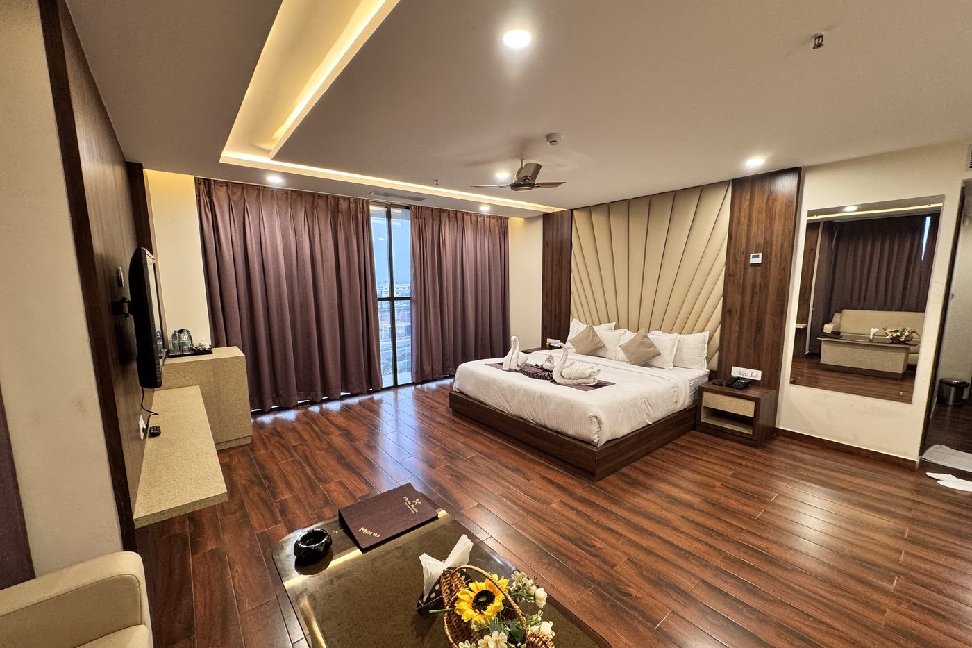 Suite with king bed and sitting area